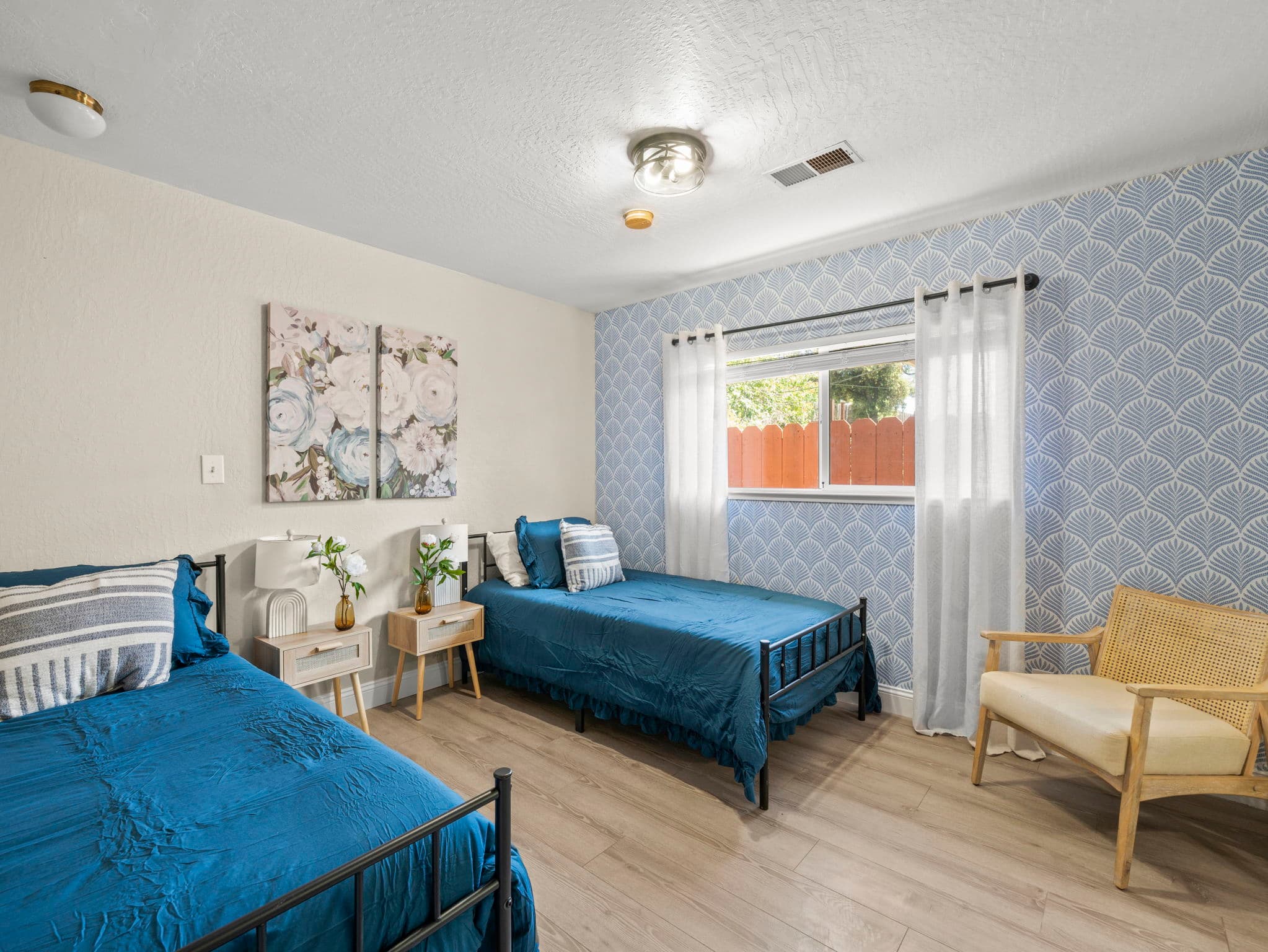 A bright, welcoming bedroom in a B2 Elevated home